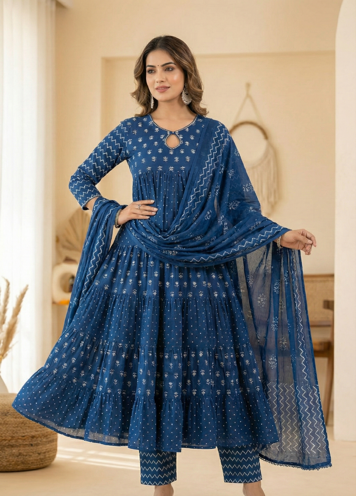 Elevate your everyday ethnic style with this stunning Indigo Blue Tiered Suit Set