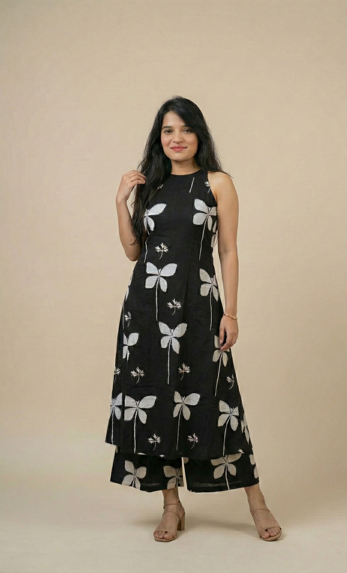 Elegant Black Butterfly Print Sleeveless Kurta and Palazzo Set