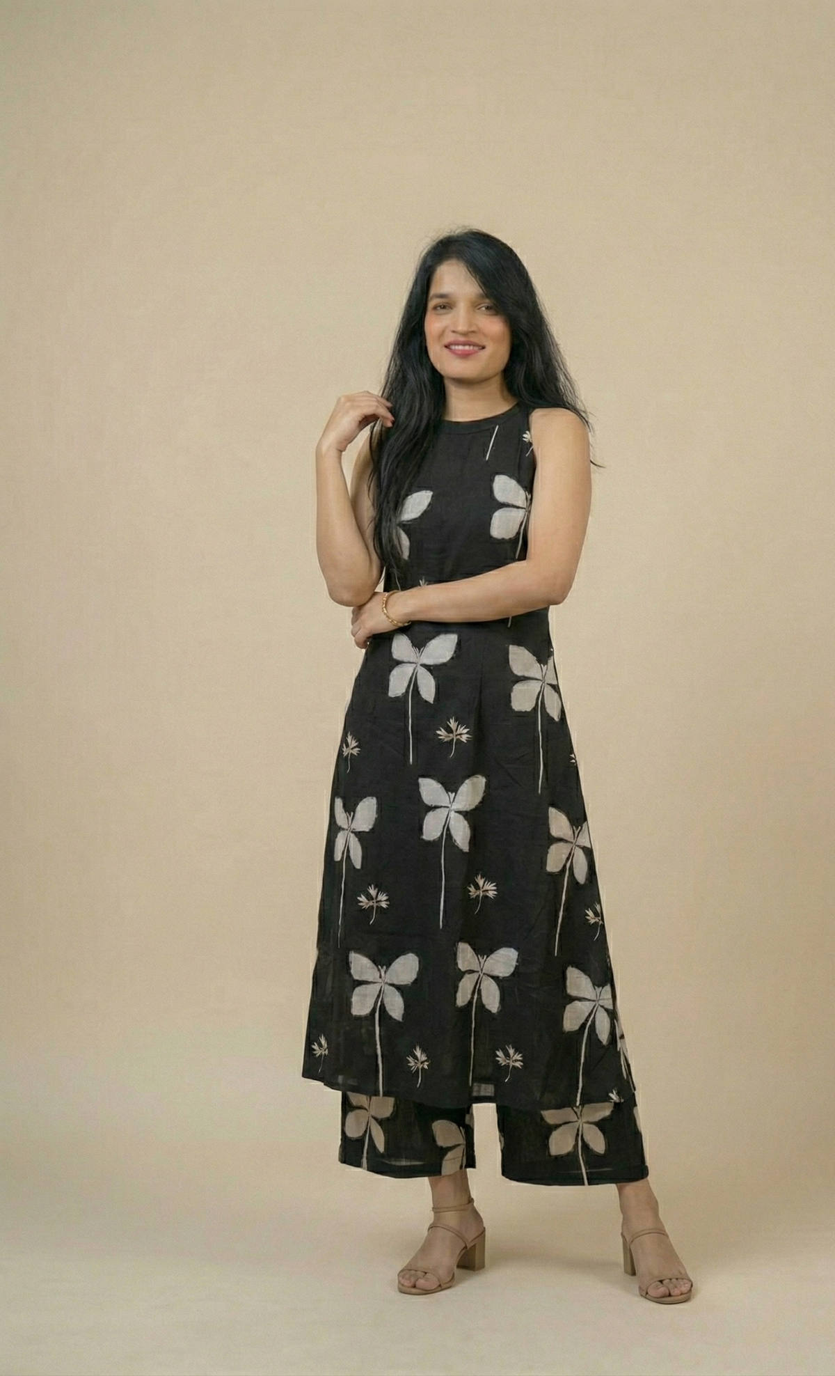 Elegant Black Butterfly Print Sleeveless Kurta and Palazzo Set