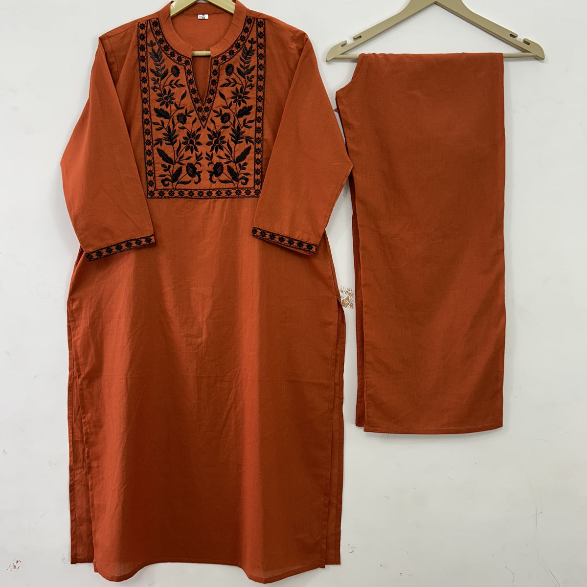 Elegant Terracotta Cotton Kurta Set with intricate Black Embroidery